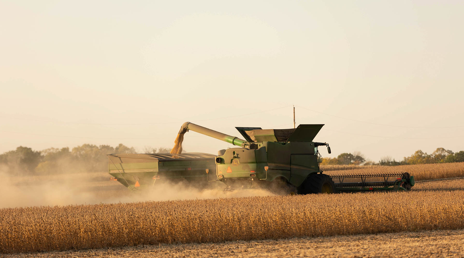 John Deere combine in field