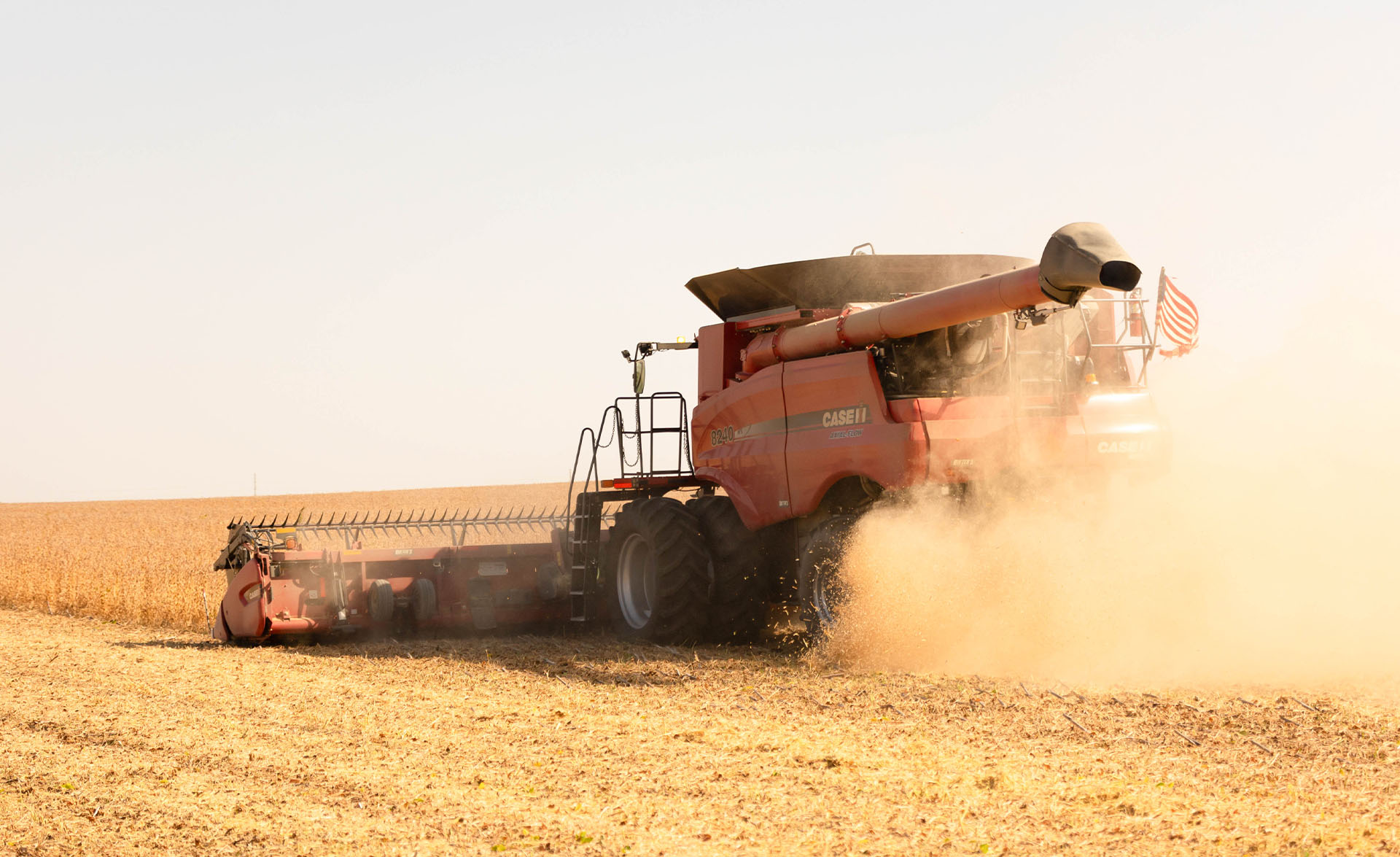 Case IH combine in soybean field