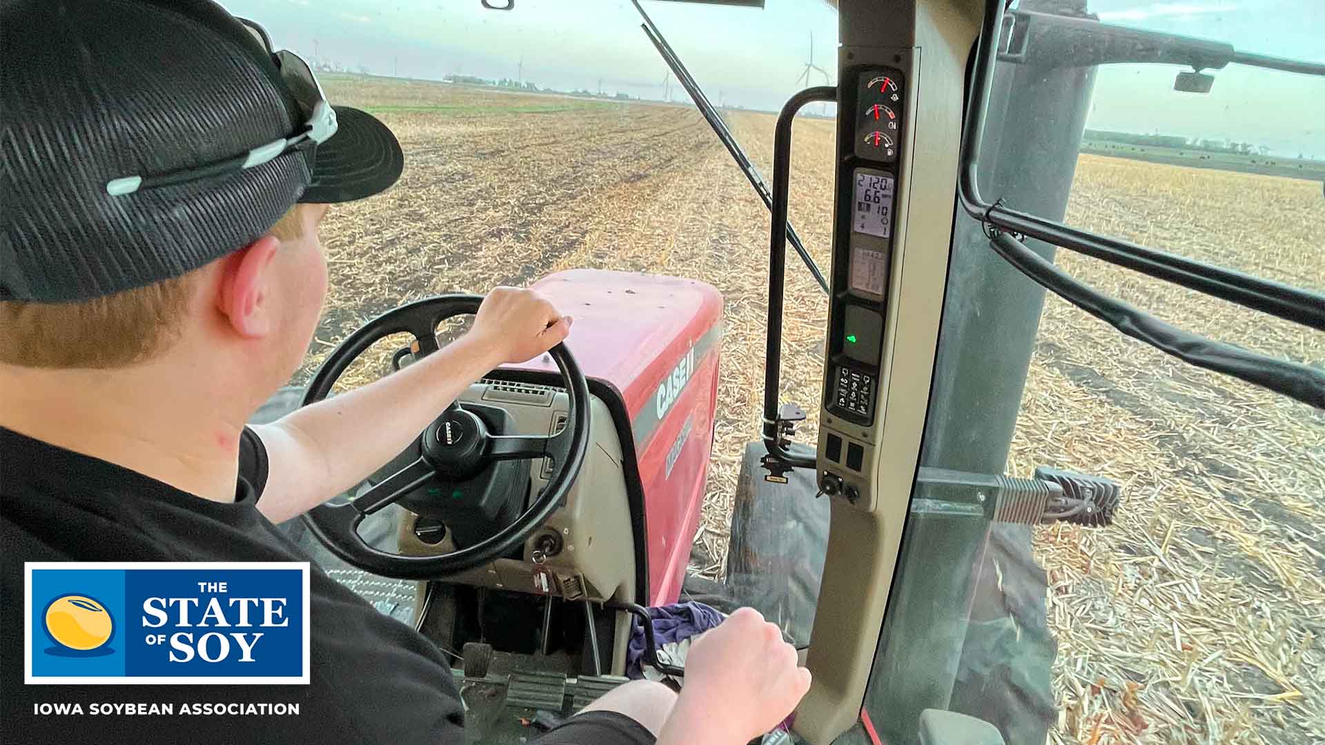 FFA chapter member driving tractor in Iowa