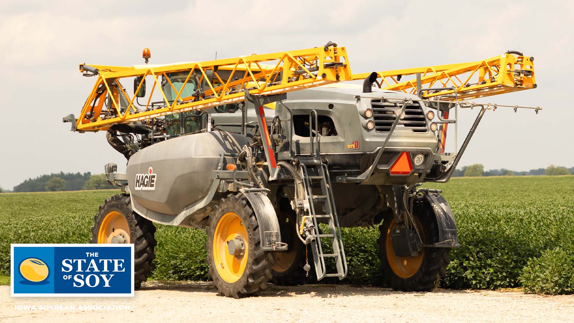 Sprayer near soybean field