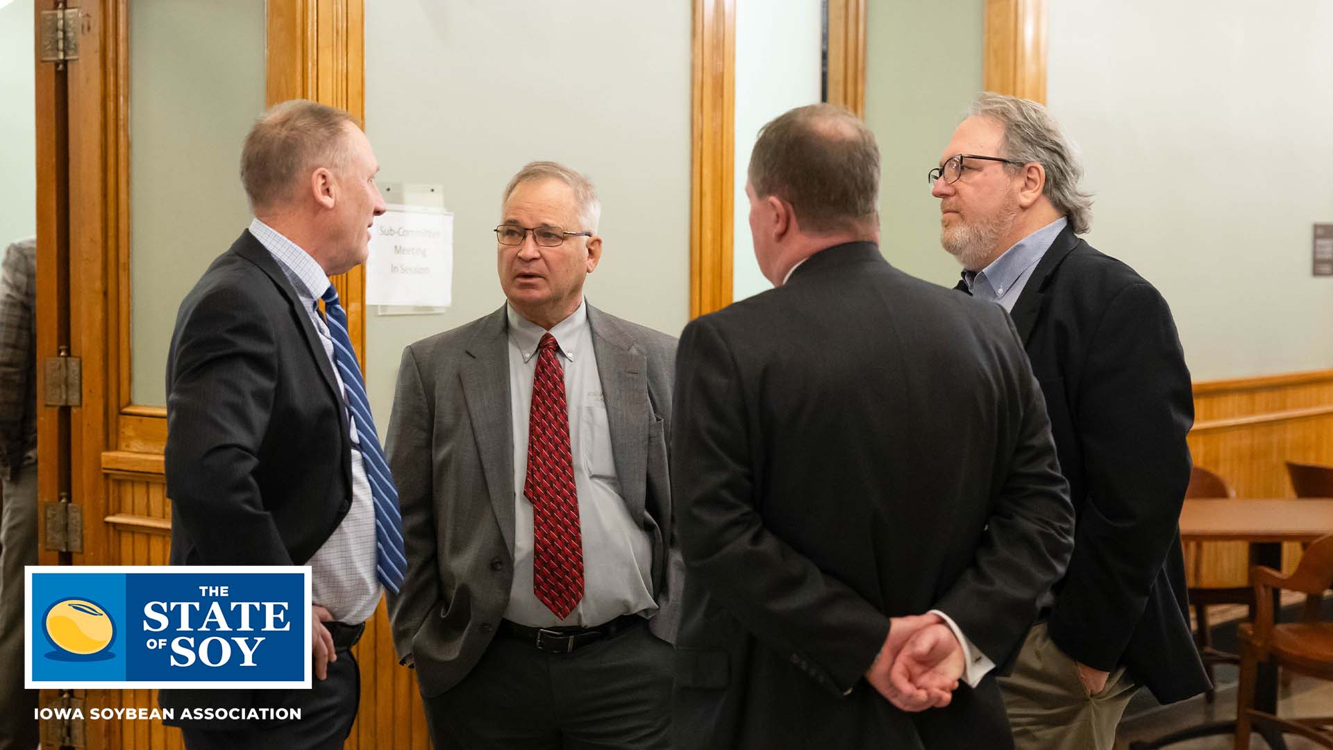 Farmers engaging with legislators.